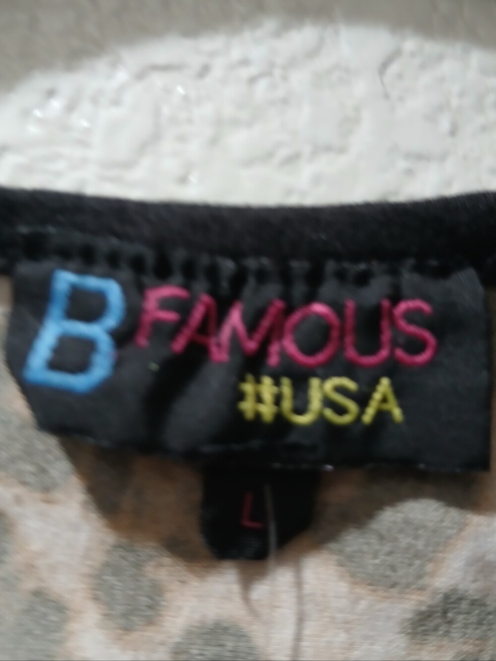 B Famous USA Nwot size L Leopard Print